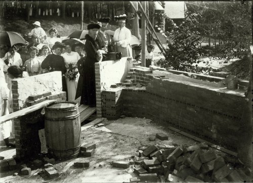 Emma Paulding, the school's director, lays the cornerstone for the new building , August 10, 1905