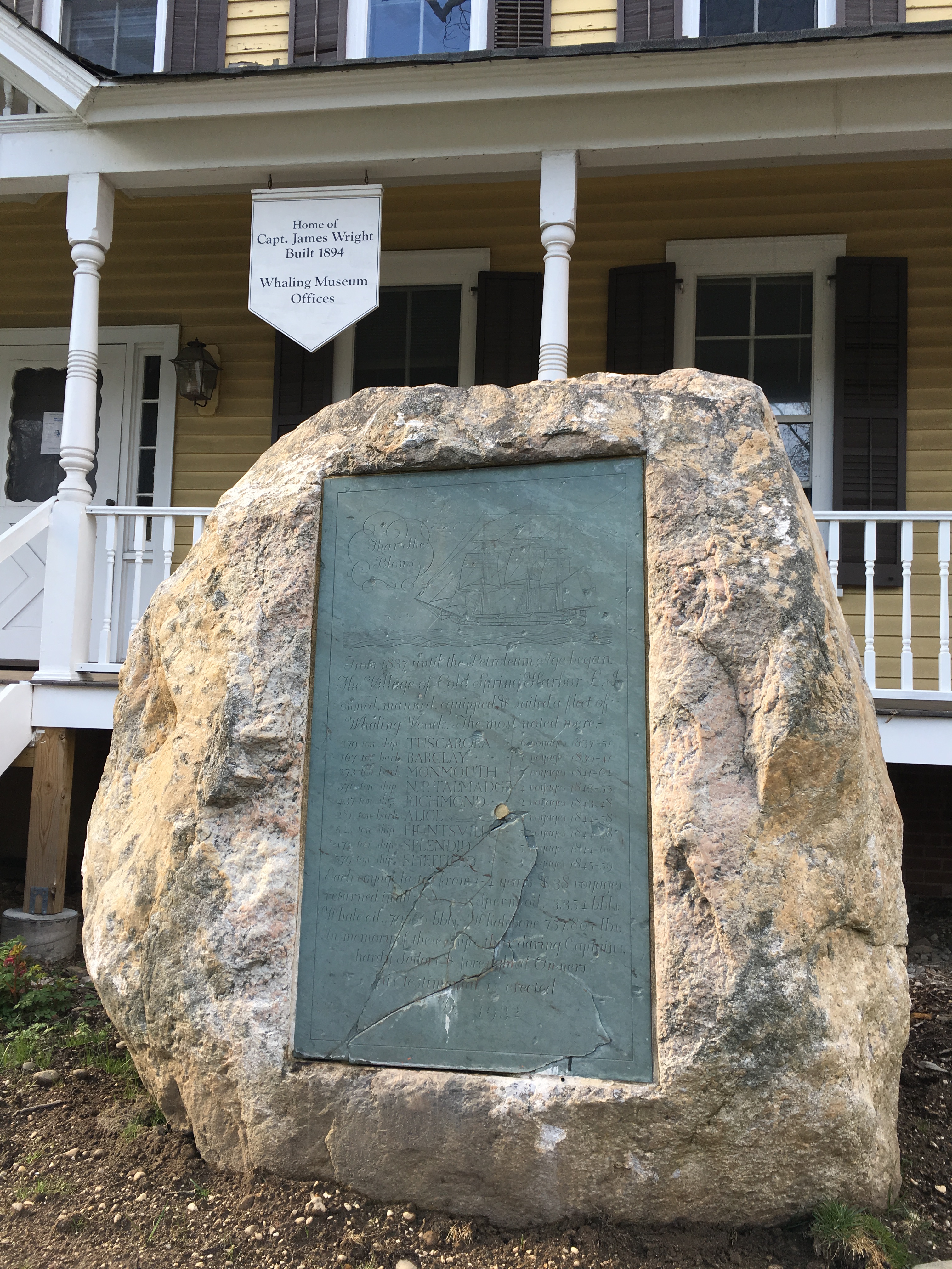 This boulder was dredged from the bottom of Cold Spring Harbor. It was originally placed in front of the odl Cold Spring Harbor library on Shore Road to commemorate the hamlet's whaling history. When the library moved from that location in the 1980s, the boulder was moved to the Whaling Museum.